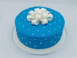Cadeau bleu et cocarde blanche
